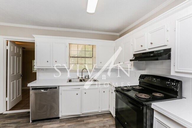 Foto del edificio - Prepare to fall in love with this 4 bedroo...