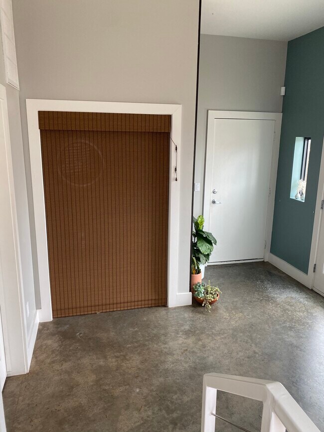 Foyer from stair view - 1432 S Trenton Ave