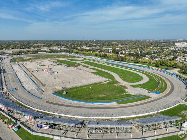 The Milwaukee Mile is a 1.015 mi oval race track next to the Milwaukee Fair Grounds.