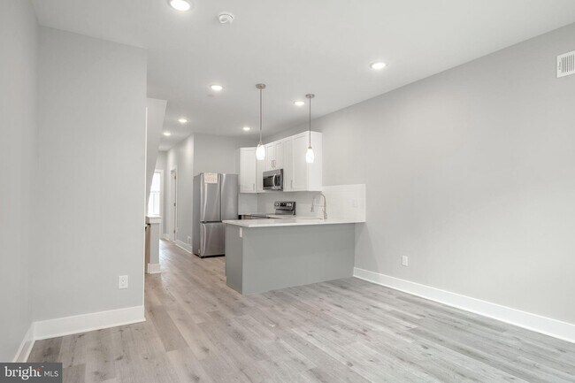 Building Photo - 5122 Ranstead Street Unit 1