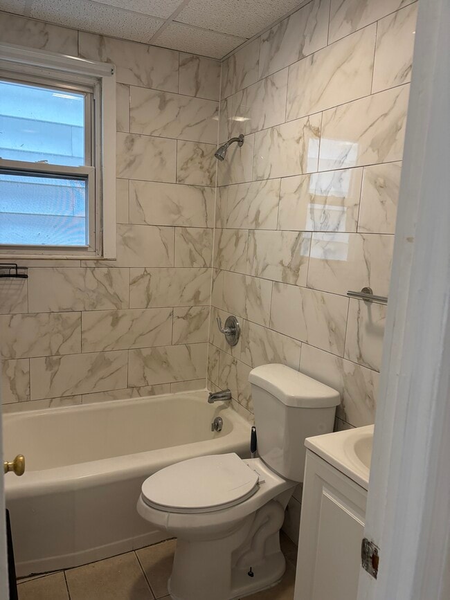 Beautifully tiled Bathroom - 240 Sommerville Pl