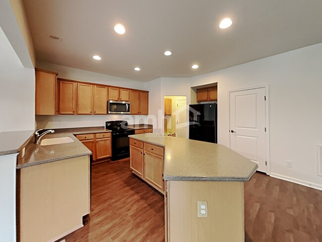 Building Photo - 7184 Kenyon Drive