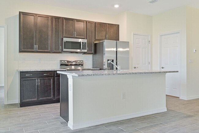 Building Photo - 3 + Den Home in NW Cape ~ Brand New ~ High...