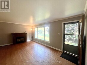 Building Photo - 2832-2832 Sunningdale Rd W