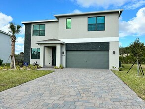 Building Photo - 5976 SE Sky Blue Cir
