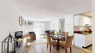 Located at 181 Southwind Dr in Wallingford, CT, this single-floor, one-bedroom, one-bathroom residence offers a thoughtfully designed layout that maximizes its efficient footprint. The open-concept living and dining area is bright and inviting, featuring light wood-tone flooring, crisp white walls, and a sliding glass door that floods the space with natural light while providing direct access to a private balcony with wooded views. The living area offers ample room for seating and entertaining, complemented by a dedicated dining space. The galley-style kitchen is well-equipped with dark granite countertops, sleek white cabinetry, stainless steel appliances, and slate tile flooring, providing a clean and functional cooking environment. The bedroom is a comfortable retreat, featuring double closets for generous storage, plush carpeting, and its own sliding glass door leading to an additional balcony. The full bathroom is finished with slate tile flooring, a white vanity, and a tub-shower combination. An entry closet provides additional storage near the front door, rounding out this practical and stylish Wallingford residence.