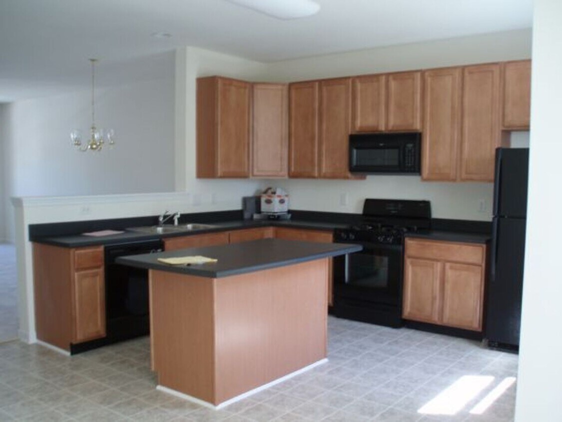 Foto del edificio - Spacious 4 Bedroom Townhome Near NC State!