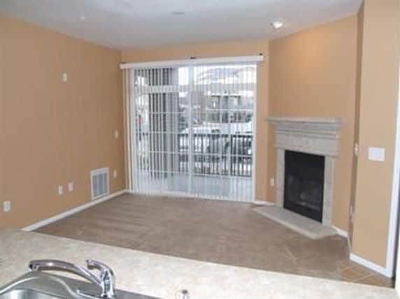 Living room with patio access - 3852 S Dallas St