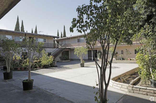Building Photo - 3030 E Artesia Blvd