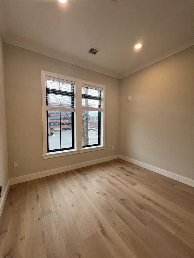 Building Photo - New - three bedrooms + two bathrooms