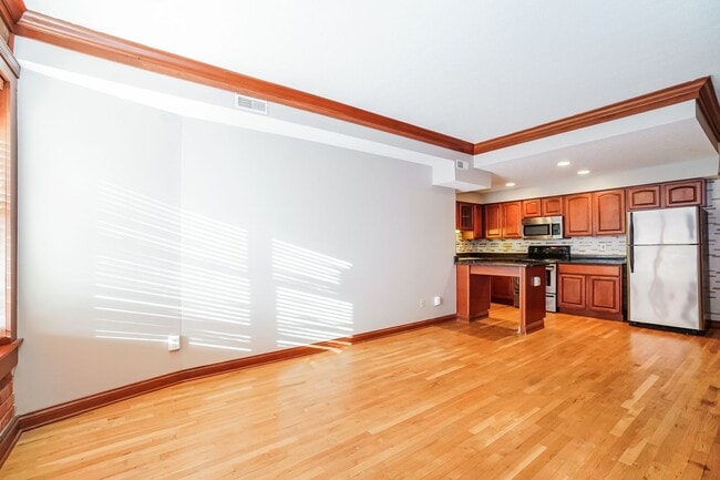 Building Photo - Charming 1-Bedroom Apartment with Exposed Brick, Hardwood Floors & Updated Kitchen