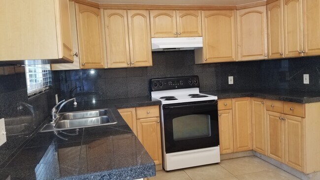 Foto del edificio - 1026 W 26th St