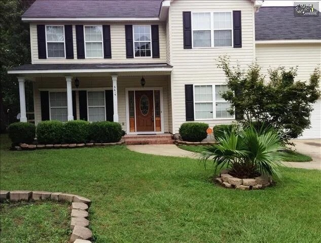 Building Photo - 6615 Windwan Dr