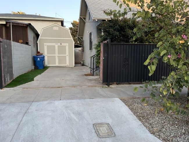 Inside the Driveway and view of Shed. - 5608 Naomi Ave