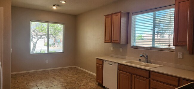Building Photo - Freshly painted & all new carpeting - 3BR ...