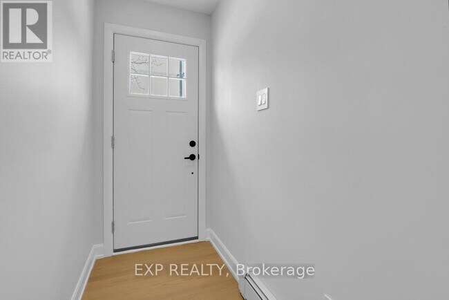 Photo du bâtiment - 555 Churchill Ave N