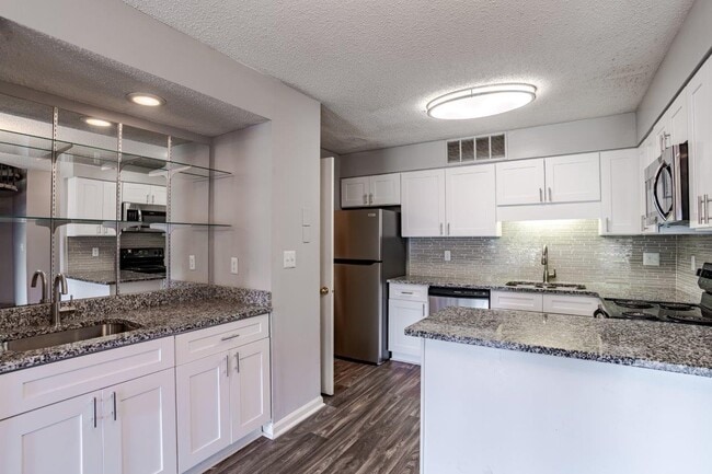 Foto del edificio - Riverwind Apartment Homes