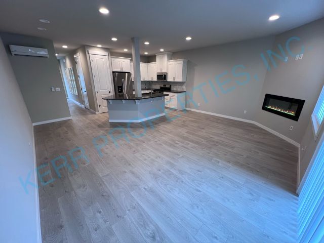 Building Photo - FREE RENT! Modern townhome living 3-Bed Retreat with 2.5 Baths in Serene Happy Valley!