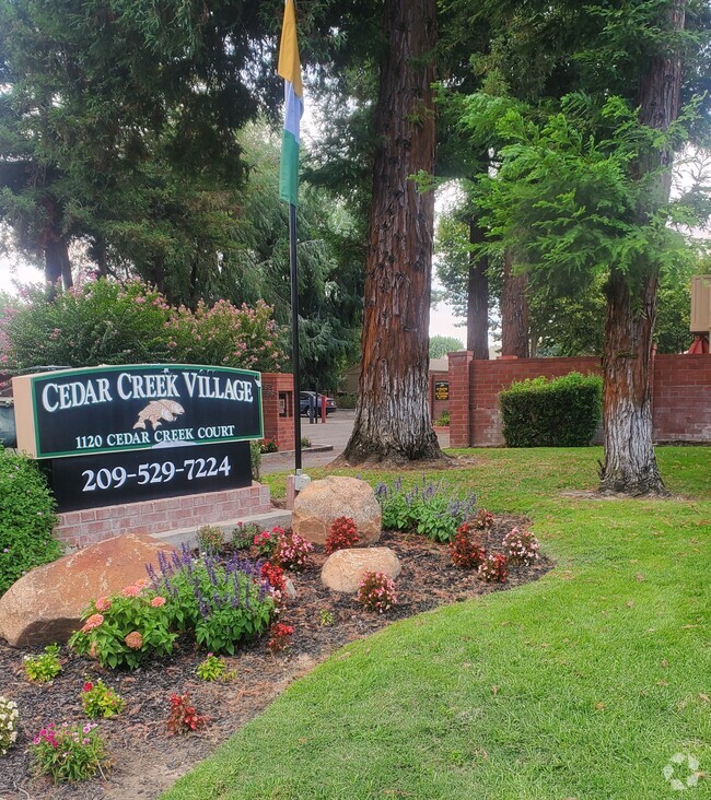 Building Photo - CEDAR CREEK VILLAGE APARTMENTS