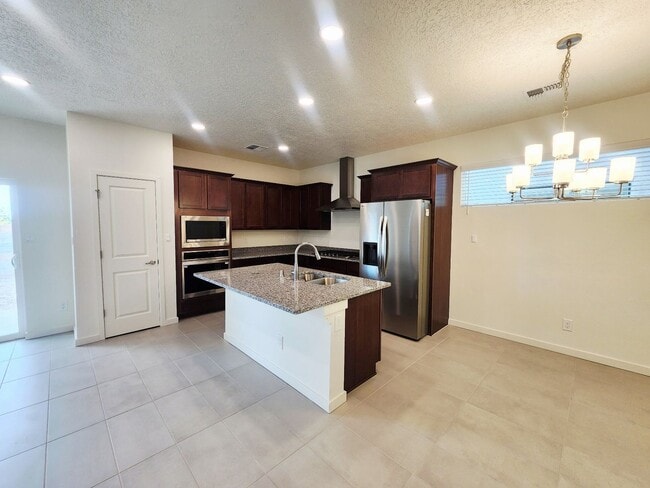 Building Photo - Brand-New Construction Townhome – Never Li...