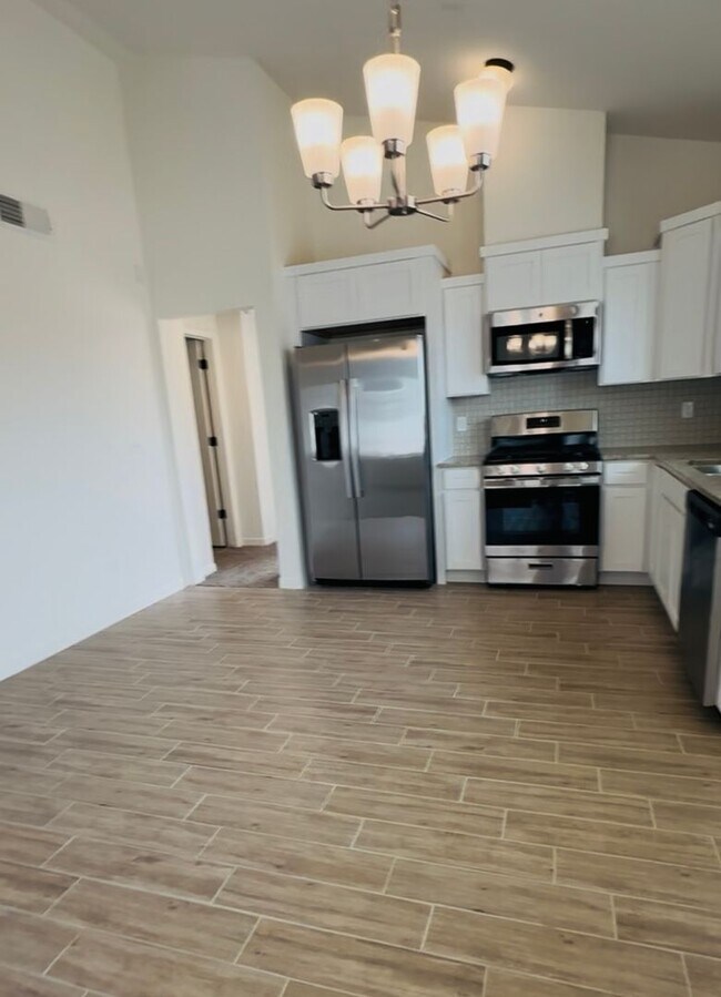 Building Photo - HALF OFF RENT FOR MAY!!