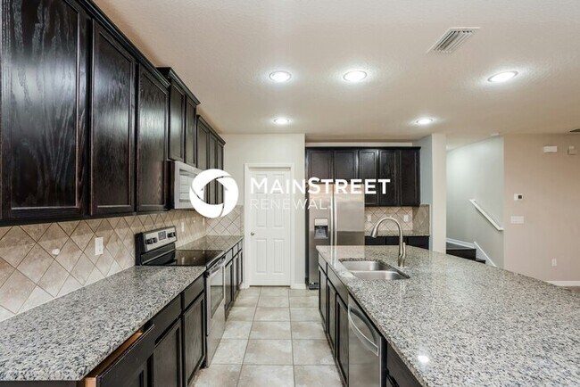 Building Photo - 4 Bedroom Pet-Friendly Home in Ruskin, FL with Main Street Renewal