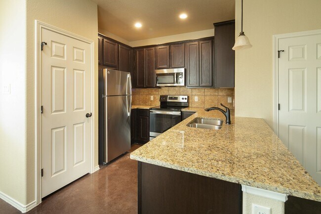 Building Photo - GORGEOUS 3 BEDROOM DUPLEX LOCATED IN BUDA,...