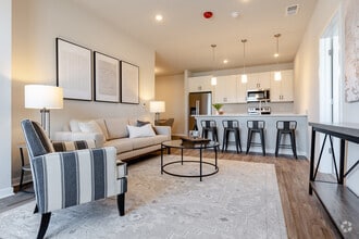3BR, 2BA - 1,245SF - Living - Seasons at Hoffman Estates