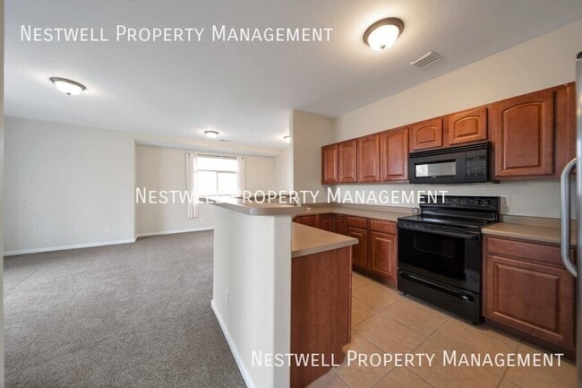 Building Photo - Cute 2-bed Condo in Vibrant Daybreak!