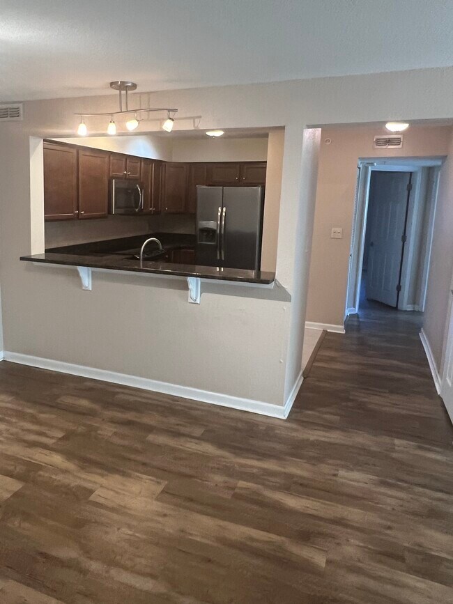 Looking towards kitchen and hallway - 1120 Ocean Trace Ln