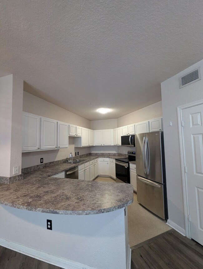 Building Photo - Must see! First floor, updates throughout!...