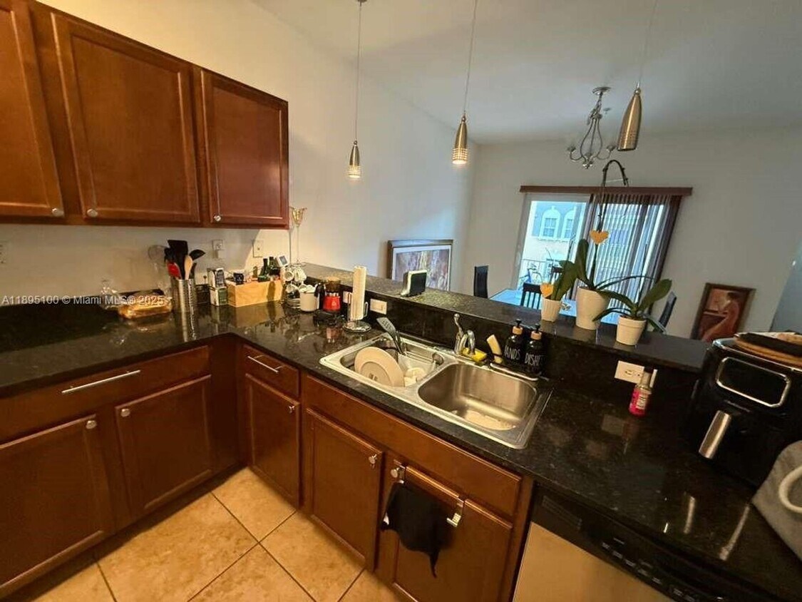 Photo - 8800 NW 107th Court 218, Doral, FL 33178