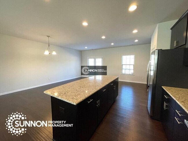 Building Photo - Beautiful 3-story End Unit in City Park!