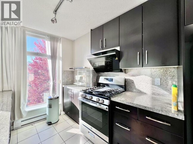 Building Photo - 5088 Kwantlen St