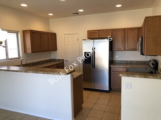 Foto del edificio - 7651 E Majestic Palm Ln