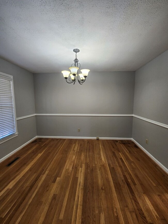 Building Photo - Spacious 3-Bedroom Brick Home with Two Living Areas & Fenced Backyard!