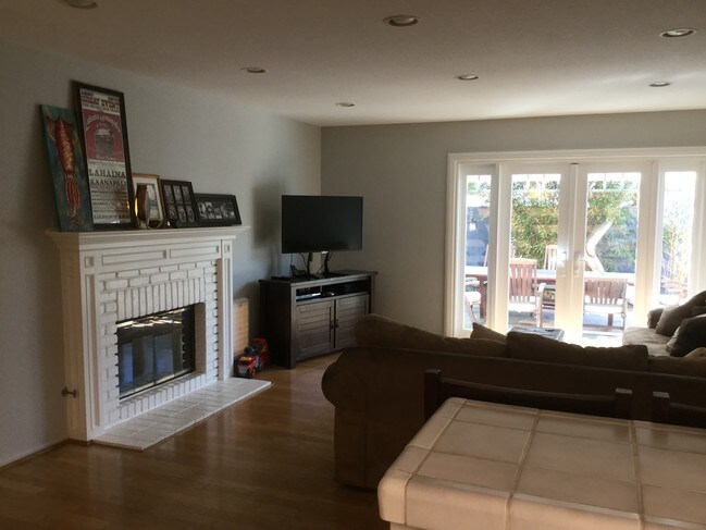 Family room-gas fireplace and French doors - 708 Flagler Ln