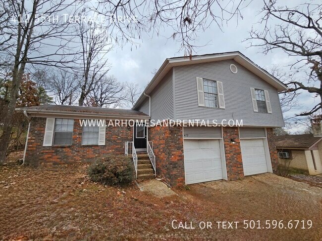 Foto del edificio - 412 55th Terrace Drive | $1595 | 4 beds, 2...