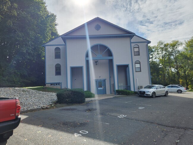 Smaller, secure building. - 24 West Rd