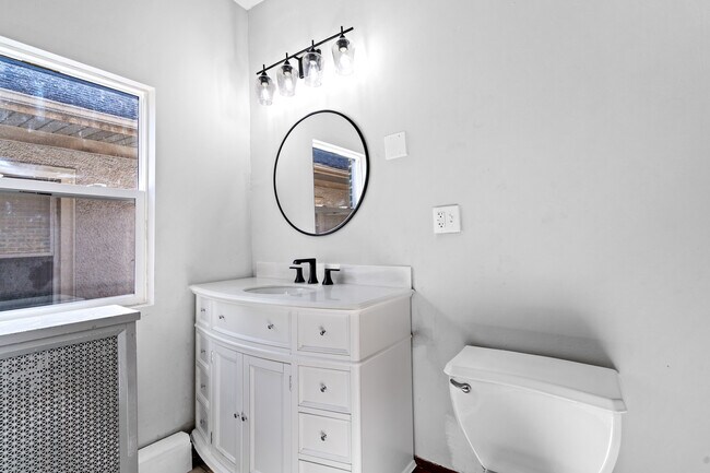 Bath Pic 1 - 5059 W Sunnyside Ave Apartments