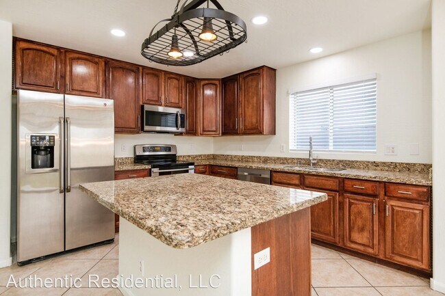 Building Photo - 4 br, 3 bath House - 11449 W MCCASLIN ROSE LN