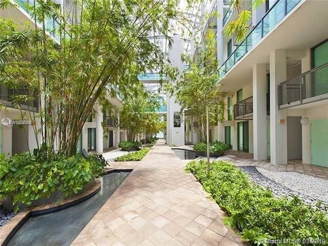 Building Photo - 6000  Collins Ave  344