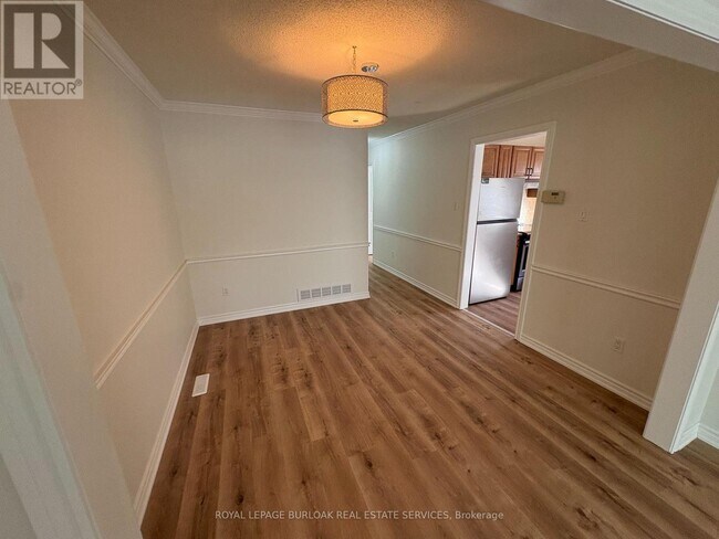 Building Photo - 3455 Caplan Crescent