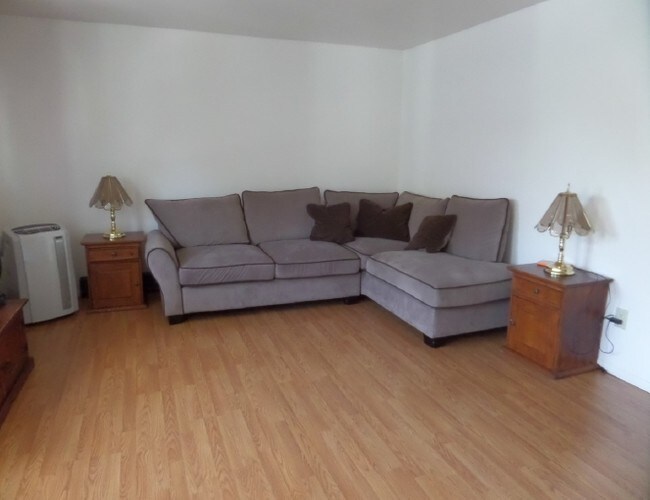 Sala de estar - Eastwood Apartments