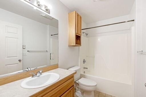 Similar layout but with new vanity, flooring, paint, and lighting. - 4865 W Reliance Rd