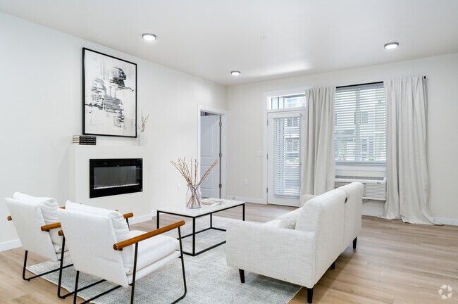 2 habitaciones, 2 baños - 1130 pies cuadrados - Sala de estar - Modelo A - Sunlight Orchards