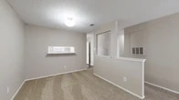 Located at 951 Turner Rd in Grapevine, TX, this single-story, 2-bedroom, 3-bathroom home offers a functional and comfortable layout with neutral tones throughout. The living room is a welcoming space featuring plush carpeting, a classic white-framed fireplace, and a window with blinds that allow natural light to filter in. The kitchen is well-appointed with white cabinetry, light stone countertops, white appliances including a refrigerator, stove, and dishwasher, and durable wood-look vinyl flooring. A double basin sink sits beneath a window, adding brightness to the space. Both bedrooms are carpeted and feature walk-in closets with built-in shelving and rods for ample storage. The primary bedroom offers a generous footprint with its own private access to a bathroom that includes a vanity with stone countertops. The three bathrooms include a tub-shower combo with classic white tile surround. Textured ceilings are present throughout, and the neutral beige wall palette provides a clean, versatile backdrop. Two hallways connect the rooms efficiently, and the entry door features a secure double-lock system. This home offers a practical and comfortable layout well-suited for everyday living.