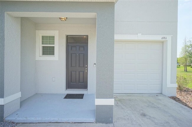 Building Photo - 6911 Breezy Palm Dr