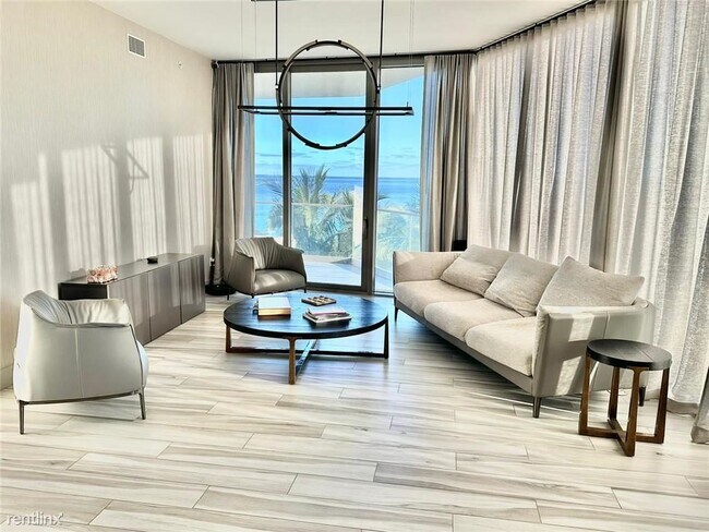 Building Photo - 2 br, 2.5 bath Condo - 18975 Collins Ave U...