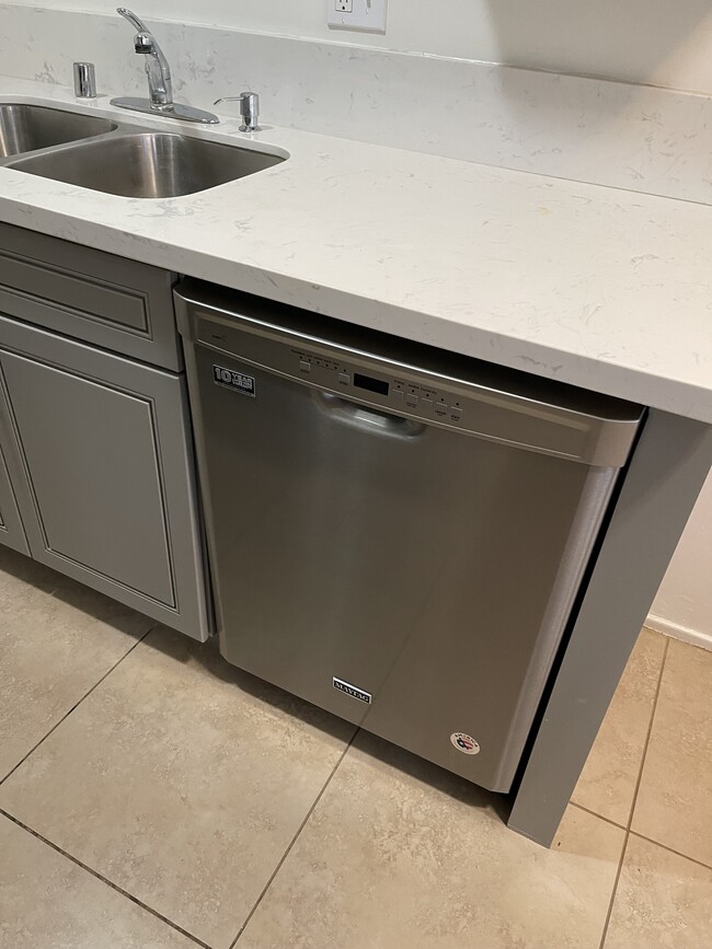 Stainless dishwasher - 303 S Almansor St